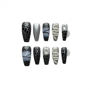 Long trapezoid black snake press-on nails with silver glitter and 3D relief art