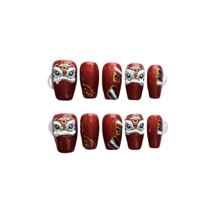Handmade red press-on nails featuring 3D embossed Chinese lion dance design and cat eye finish