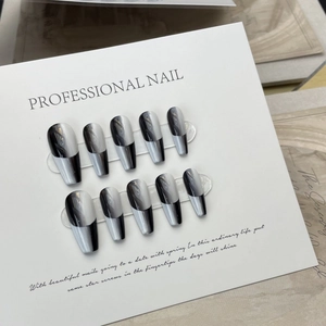 Handmade press-on nails featuring a black and white gradient French art design