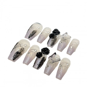 Gothic press-on nails with black 3D roses, pearls, and crystals on a gradient base