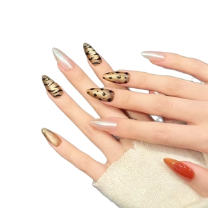 Leopard print and golden cat eye handmade press-on nails in long stiletto shape