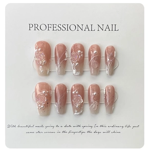 Detail of 3D resin roses and pearls on gradient nude pink handmade press-on nails