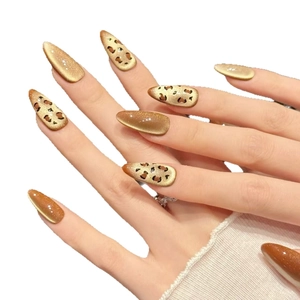 Caramel leopard print press-on nails with sparkling golden cat eye magnet effect