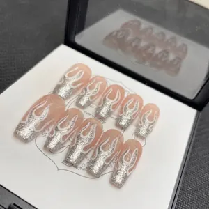 Handmade aurora flame bear press-on nails set with glitter silver fire design on nude base
