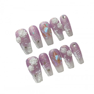 Handmade purple gradient press-on nails with 3D white roses and sparkling crystals