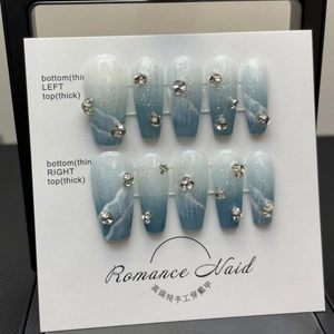 Handmade blue ocean gradient press-on nails with sparkling glitter and rhinestones