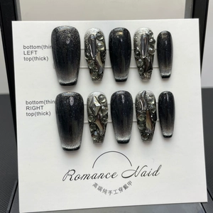 Handmade black cat eye press-on nails with luxury crystals and silver metallic accents