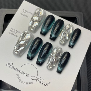 Handmade emerald cat-eye press-on nails with luxury coffin shape and crystal rhinestones