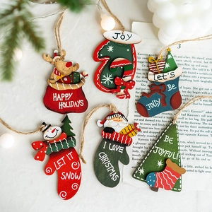 6-piece Christmas wooden ornament set featuring Santa, snowman, and reindeer designs