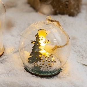 Illuminated glass Christmas ball ornament with wooden snowman inside and warm LED light