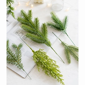 Set of four artificial pine and PE needles for Christmas wreaths and home decor