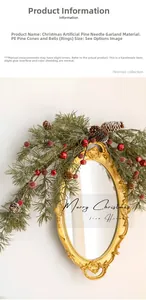 Close-up of Christmas garland with pine needles, red berries, cones, and golden bells