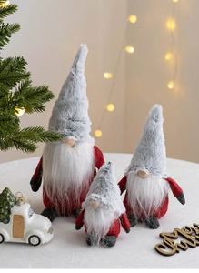 Three festive Christmas gnomes in red and grey plush fabric for indoor holiday decor