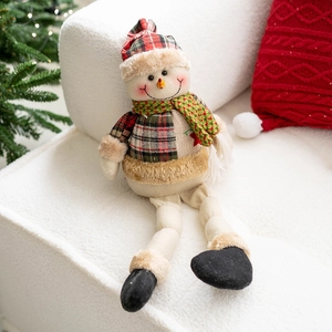 Christmas snowman plush doll with long legs and plaid knitting decoration on white sofa