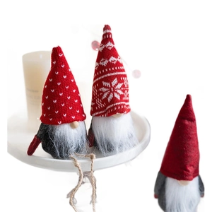 Three Christmas gnomes set with red hats and white beards for holiday home decor