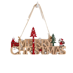 Wooden Merry Christmas hanging sign with carved letters and festive holiday patterns