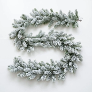 Guirlande de Noël artificielle avec texture enneigée pour décoration de fêtes