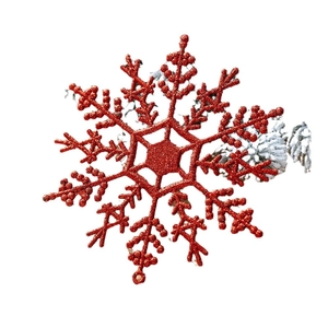 Sparkling red glitter snowflake ornament for Christmas tree decoration on white background