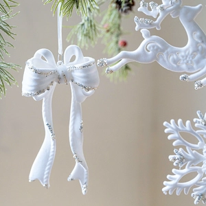 Décorations de Noël floquées blanches avec renne et nœud papillon et paillettes argentées