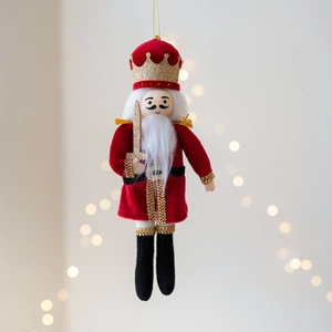 Nutcracker King plush ornament with red velvet robe and golden crown for Christmas tree