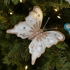 Farfalla decorativa bianca con brillantini dorati e cristalli su albero di Natale