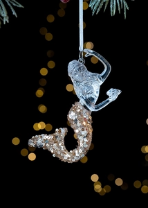 Detail of acrylic mermaid ornament with gold sequins and silver string for Christmas tree