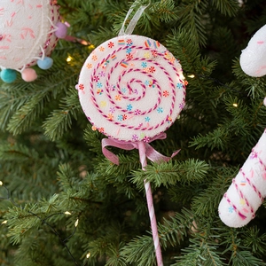 Colorful foam candy cane and lollipop Christmas tree ornaments with pink sequin bows