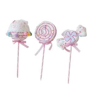 Three-piece set of foam candy cane and cupcake ornaments with pink bows for Christmas tree
