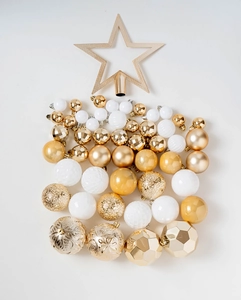 Macro shot of 50pcs gold and white Christmas ball set with star tree topper in gift box