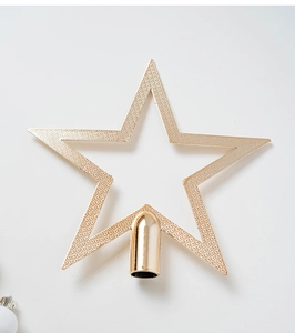 Detailed view of a golden hollow star tree topper with sparkling metallic glitter finish