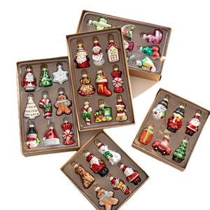 Christmas glass ornament set with Santa, snowman and tree shapes in brown gift boxes