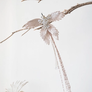 Elegant champagne gold bird Christmas tree ornament with velvet wings and pearl beads