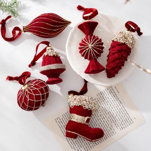 Burgundy velvet Christmas ornaments set with gold glitter and sequins for tree decoration