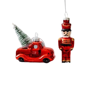 Christmas glass ornaments set with a vintage red truck and Nutcracker soldier figures