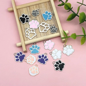 Colorful animal paw print charms in various colors for DIY jewelry and crafts