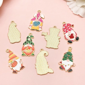Colorful enamel gnome holiday pendants set with Easter, Halloween, and Christmas themes