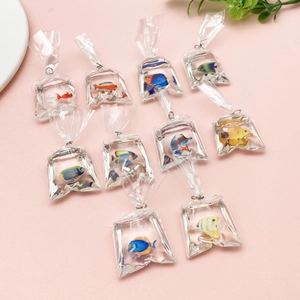 Detailed view of creative resin goldfish pendants in mini water bags for DIY keychain crafts