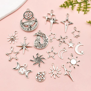 Vintage silver celestial charms set featuring moon, star, and sun pendants for DIY jewelry