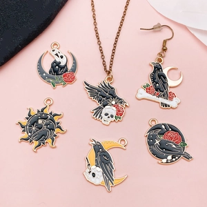 Gothic punk jewelry set featuring sun, moon, and crow charms with red rose enamel detail