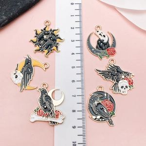 Set of 6 punk raven and skull enamel charms with gold trim for DIY jewelry making