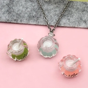 Luminous resin coffee cup pendants in green, blue, and pink for DIY accessories