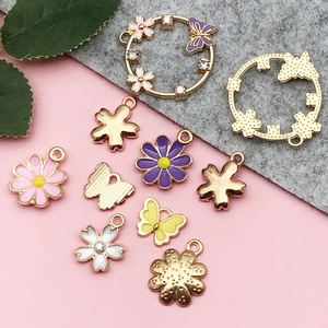 Floral and butterfly enamel charms with rhinestones for DIY necklaces and jewelry making
