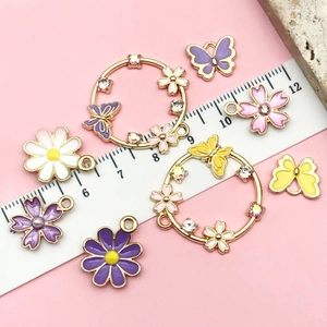 Floral and butterfly enamel pendants with rhinestones for DIY jewelry making