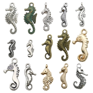 Assorted vintage alloy seahorse charms in gold and silver for DIY jewelry making