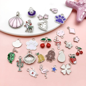 Assorted enamel alloy charms featuring shells, bows, and animals for DIY jewelry