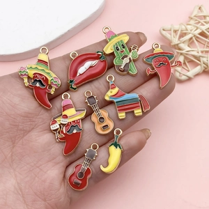 Mexican fiesta themed charms set with red chili and guitar cactus in gold plating