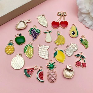 Colorful summer fruit enamel charms in pineapple, strawberry, and lemon for DIY jewelry