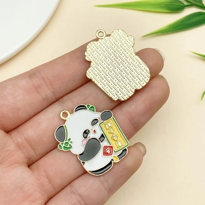 Detail of a panda charm with Dragon Boat Festival scroll held in hand