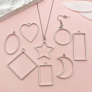 Silver geometric metal pendant frames for DIY jewelry in star and heart shapes