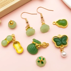 Traditional gold-plated alloy jewelry set with faux jade pendants and floral charms